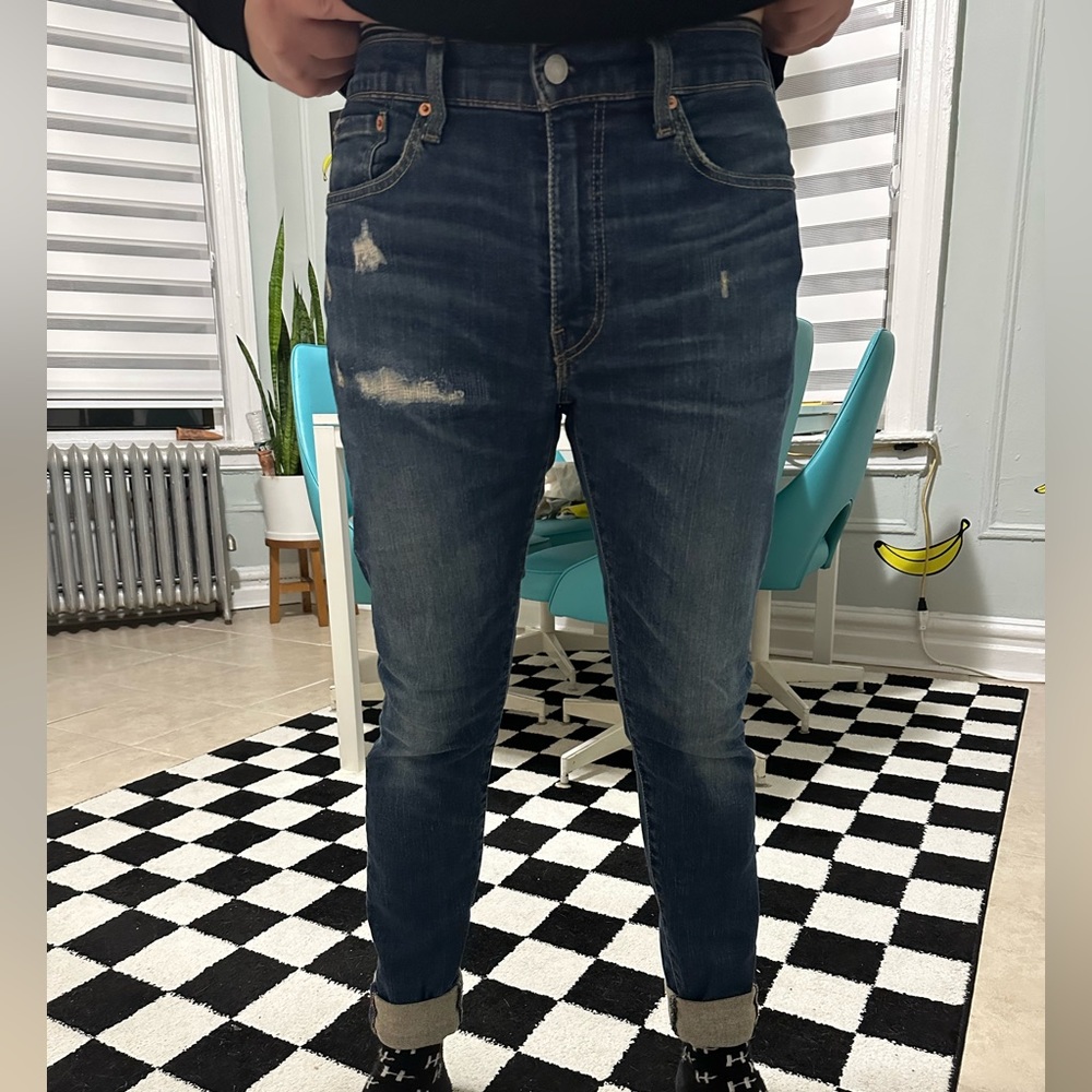 Levi’s skinny taper, 32x30 distressed blue jeans